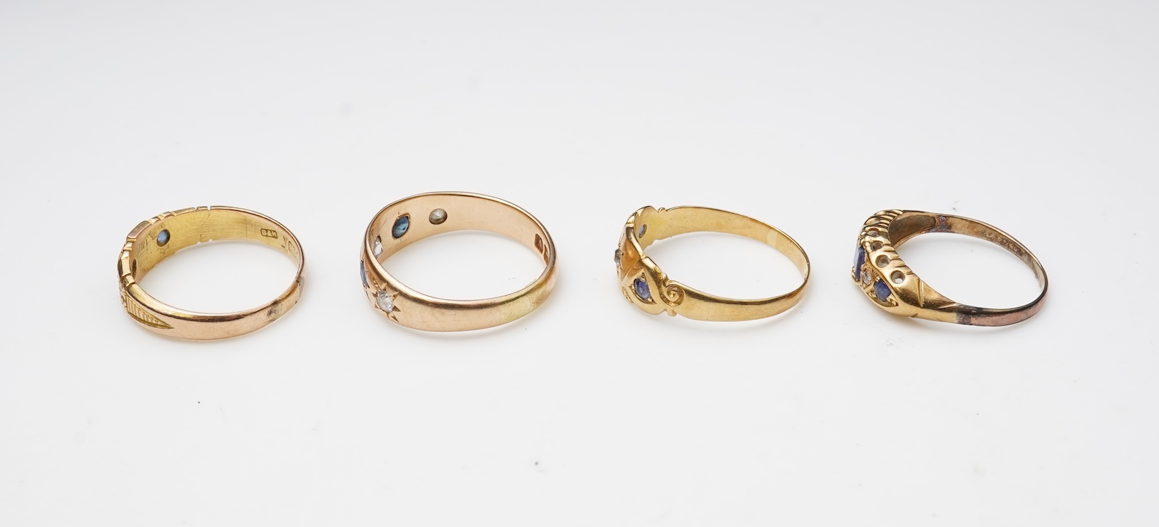 A group of four sapphire rings, late 19th/early 20th century